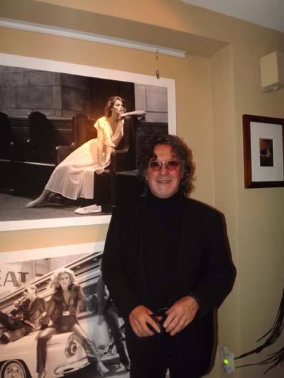 Photographer Robert Farber with his photo of Gia Carangi taken at Keaton Hall, Fordham University, the Bronx, New York City.